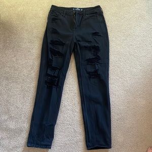 Black distressed jeans.